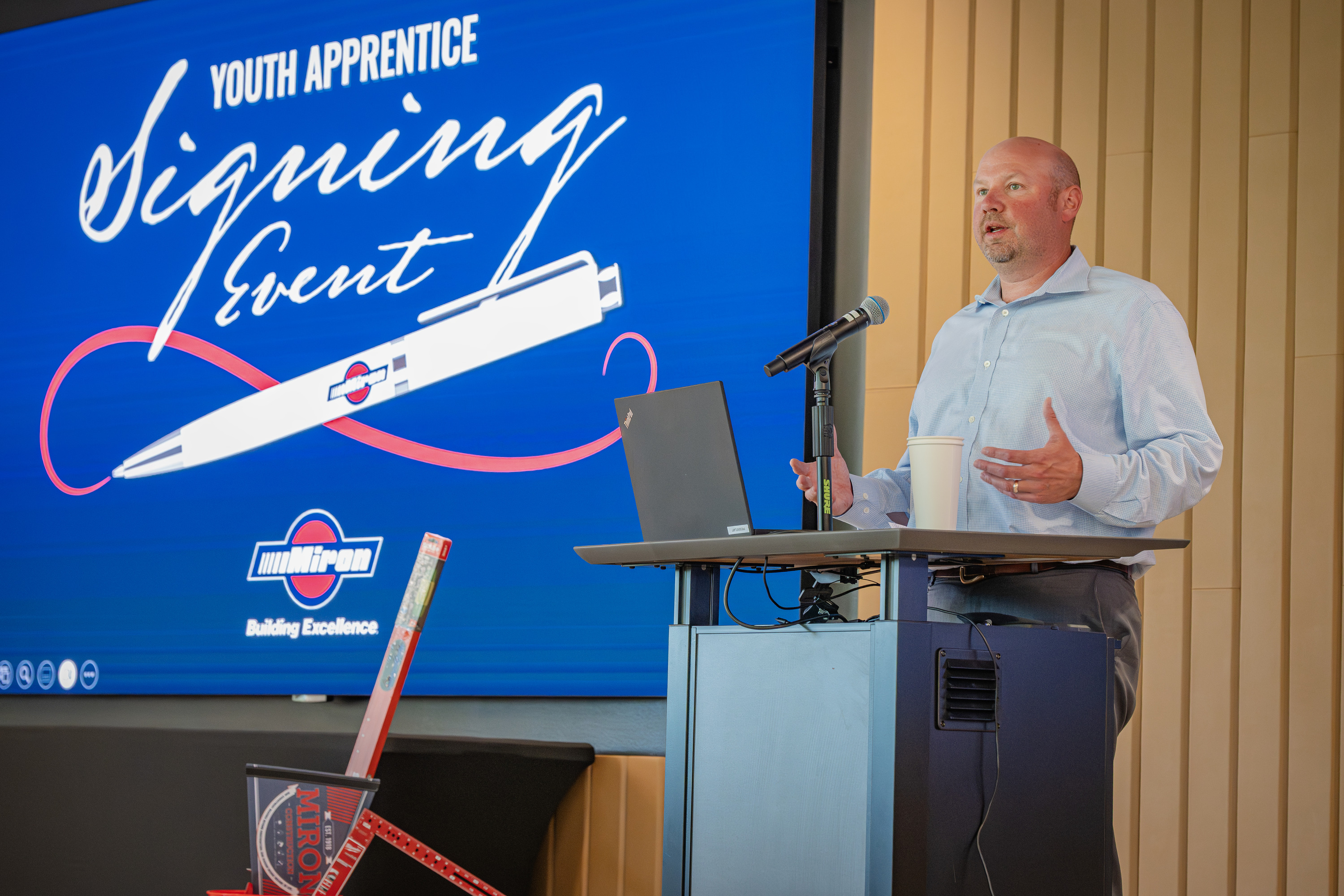 Miron presenter speaking at the Youth Apprentice Signing Event