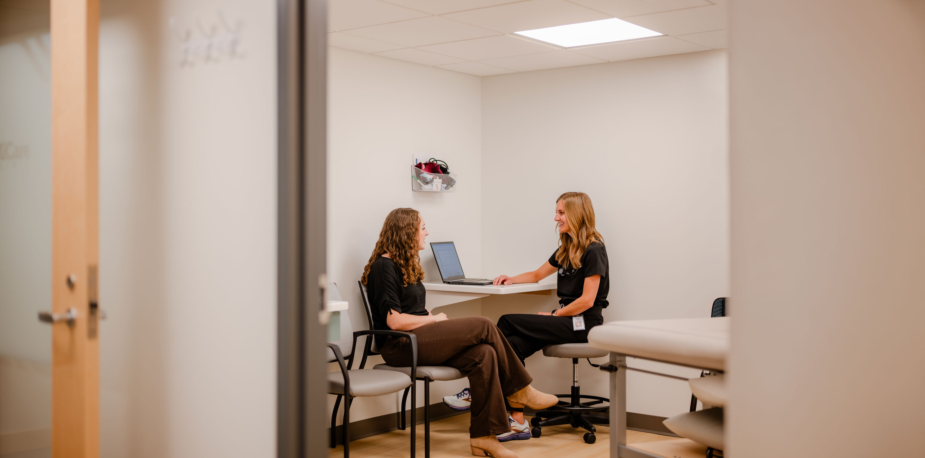Provider meeting with a patient at a MiCare clinic