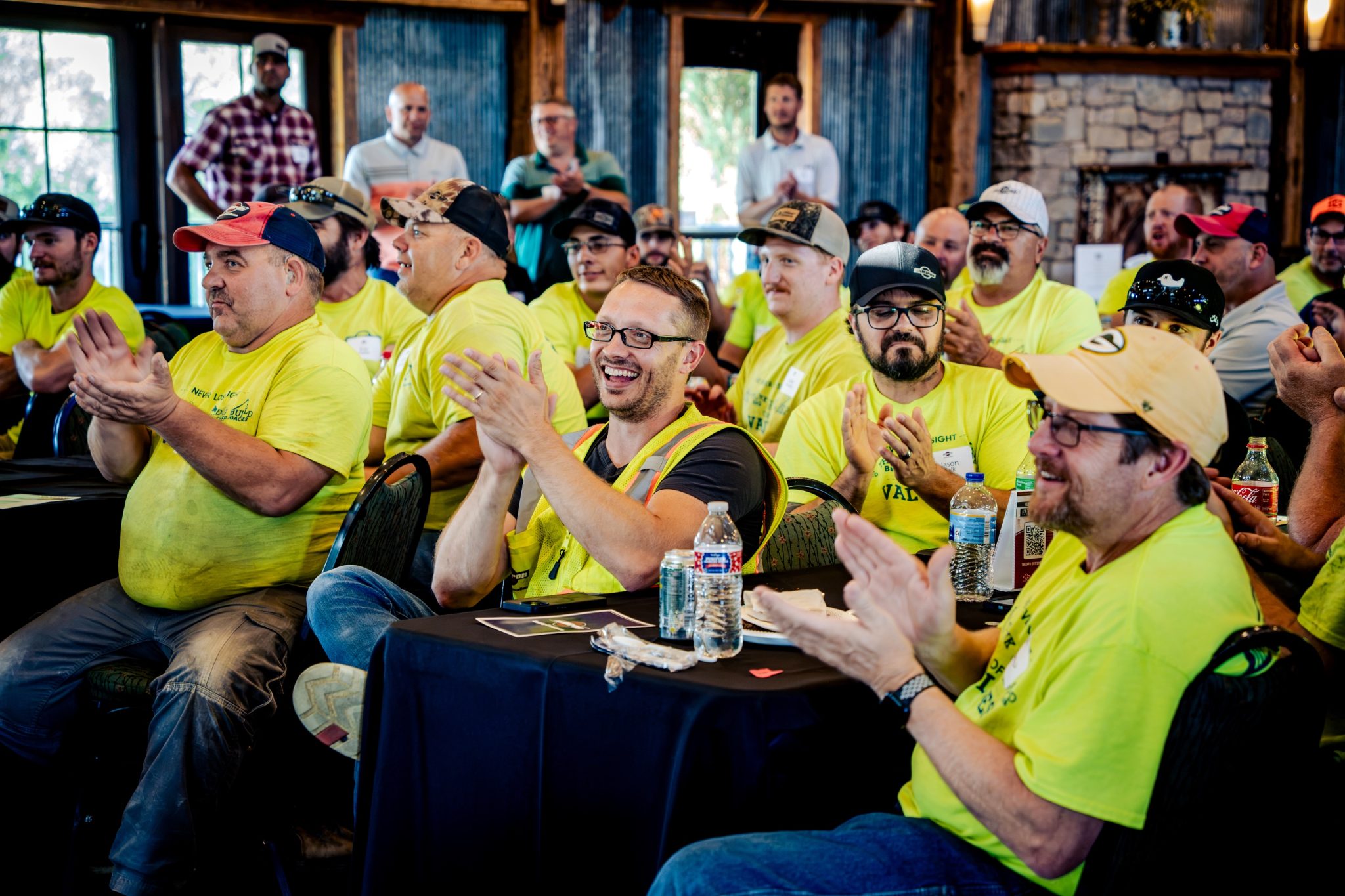 Miron craftspeople applauding at an appreciation event